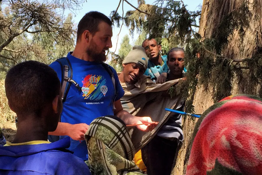 Park Williams coring a tree in the Gondar region of Ethiopia.( Image: Marcin Koprowski)