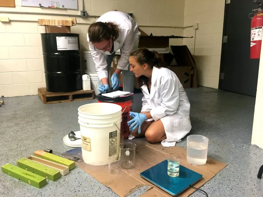 High school intern Julia Grandury (right) works with Elizabeth Eiden (left), an undergraduate intern from the California Institute of Technology. The two students are spending the summer in the lab of scientist Einat Lev, conducting research on lava lakes and open-vent volcanoes. (Photo: Einat Lev)