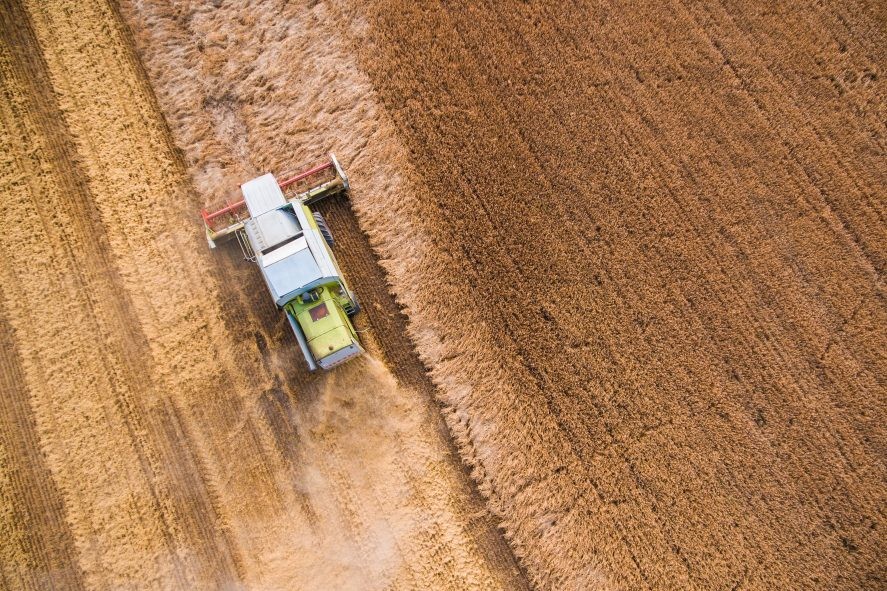 Harvester in a field