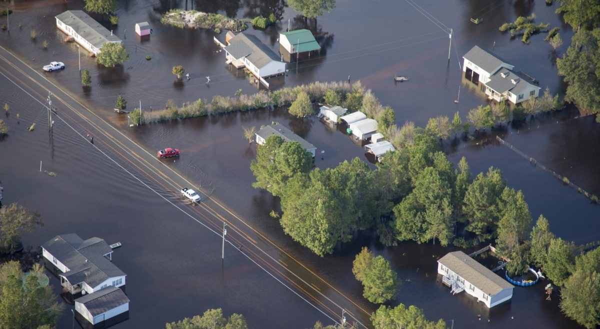 Buildings surrounded by water flowing out of North Carolina’s Cape Fear River in the aftermath of Hurricane Florence. (Photo: Staff Sgt. Mary Junell/U.S. Army)