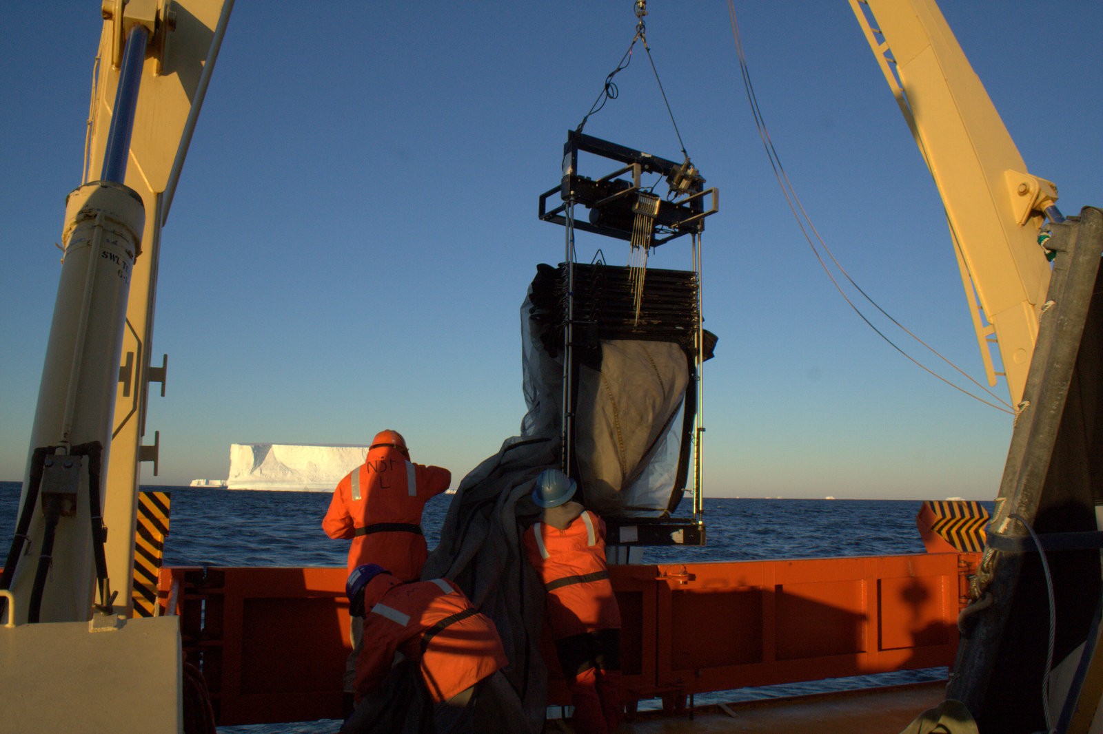 Scientists launch a Multiple Opening/Closing Net and Environmental Sensing System (MOCNESS) from the R/V Gould off the West Antarctic Peninsula. When towed behind a research vessel, the system’s nets collect plankton while sensors provide real-time information about the physical properties of the seawater. (Photo: Naomi Shelton/LDEO) Scientists launch a Multiple Opening/Closing Net and Environmental Sensing System (MOCNESS) from the R/V Gould off the West Antarctic Peninsula.