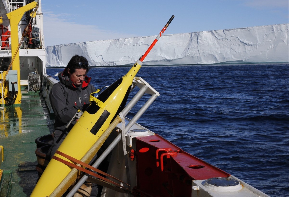 Pierre Dutrieux preparing a Seaglider for deployment in front of the Dotson Ice Shelf, West Antarctica, during a summer 2018 research expedition. (Photo courtesy of Pierre Dutrieux)