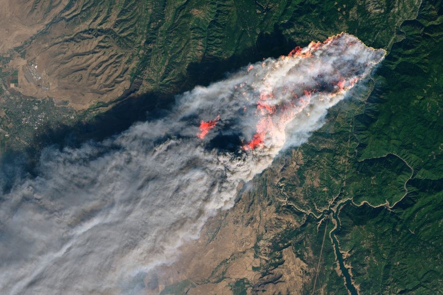 The Camp fire burning in northern California on November 8, 2018. (NASA Earth Observatory image by Joshua Stevens, using Landsat data from the U.S. Geological Survey.)