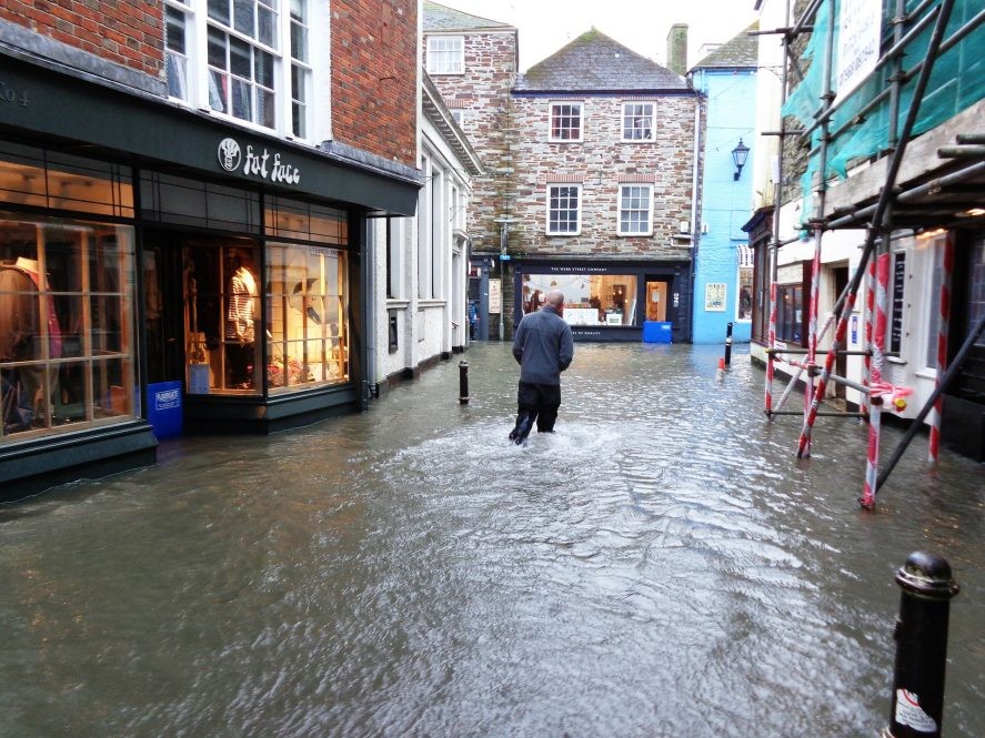 A man wades through a flooded Cornwall street after severe winter storms hit the United Kingdom. (Image: Pixabay) A man wades through a flooded Cornwall street after severe winter storms hit the United Kingdom. (Image: Pixabay)