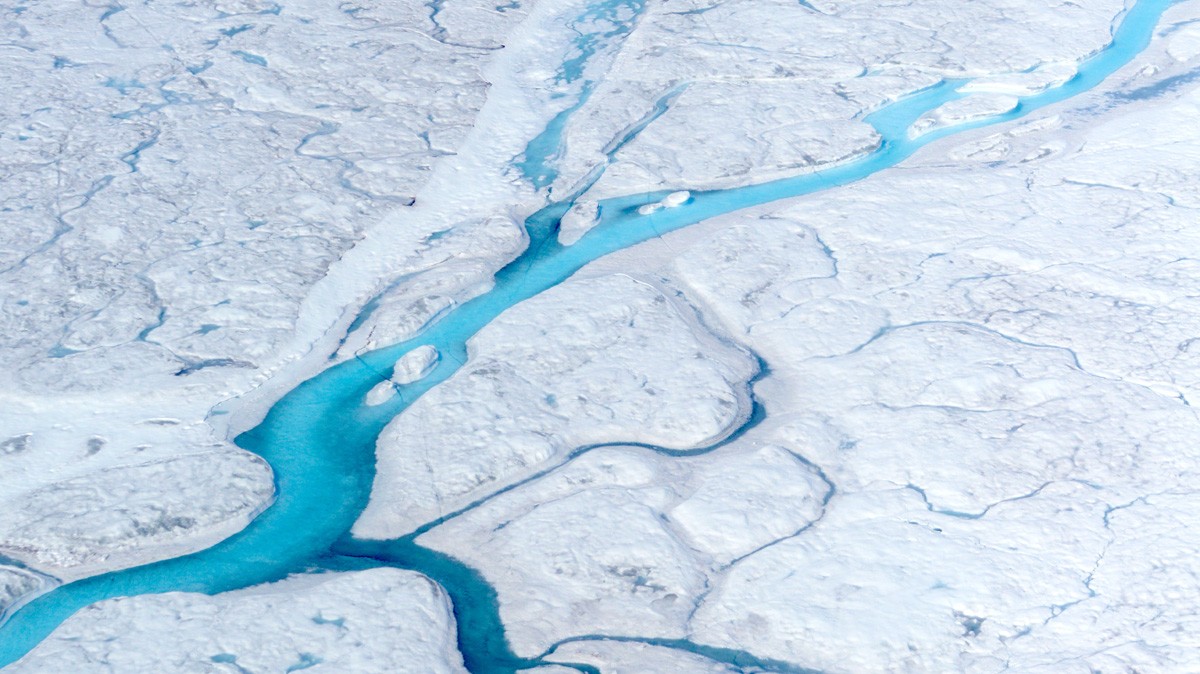 Rivers of meltwater flow across the Greenland ice sheet. (Photo courtesy of Marco Tedesco/Columbia University)